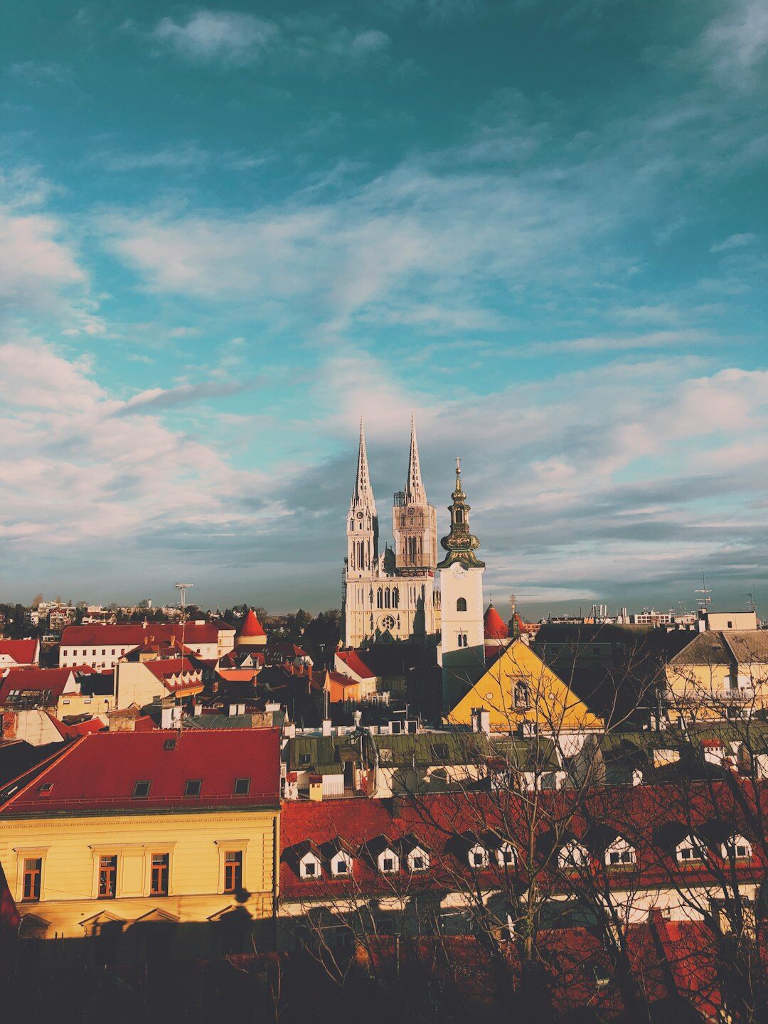 Historic rooftops and church tower of Zagreb's upper town at dusk